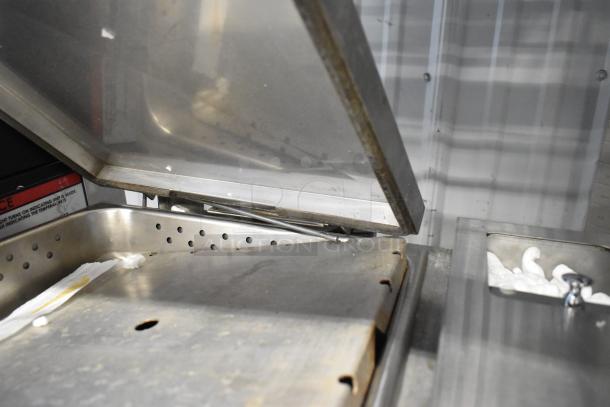 Roundup DFWT-150CF Commercial Deluxe Food Warmer, stainless steel, 120 Volts, 1 Phase, in used condition.