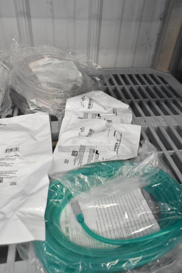 16 medical supply items including ResMed HumidAir11 39100, ClimateLineAir 11 AMER 39102, AirFit P30i 63854, and AirFit 30i Headgear 63814 in sealed packaging, indicating new condition.