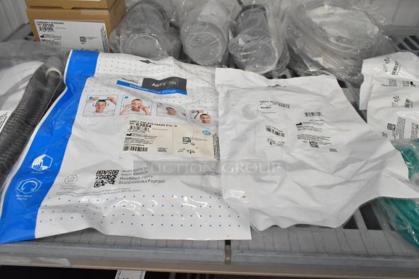 16 assorted medical supplies including Humidair11 39100, Climatelineair 11 39102, Airfit P30I 63854, new in packaging.