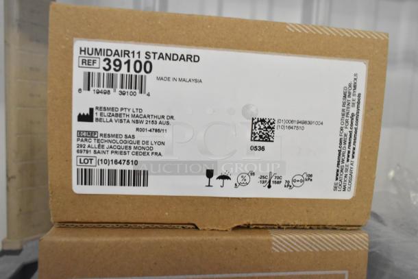 Cardboard box of Humidair11 Standard, Ref 39100, by Resmed. Includes manufacturer details and handling symbols.