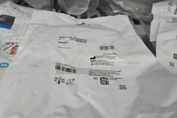 16 various ResMed items including Humidair11 39100, Climatelineair 11 39102, Airfit P30I 63854, and Airfit 30I Headgear 63814. Packaging shows product details and specifications.
