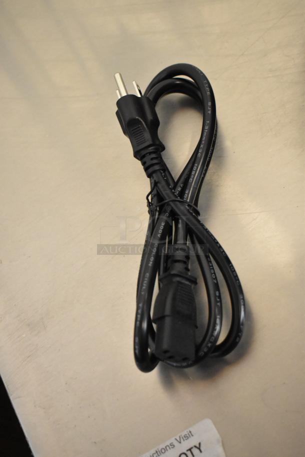 Black power cord for Galaxy 177GCU100 coffee urn, coiled and secured with a twist tie.