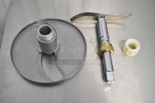 Brand new Avantco 177MX20SKNIF slicer knife assembly, MX20 series, with minor scratches, shown disassembled on a metal surface.