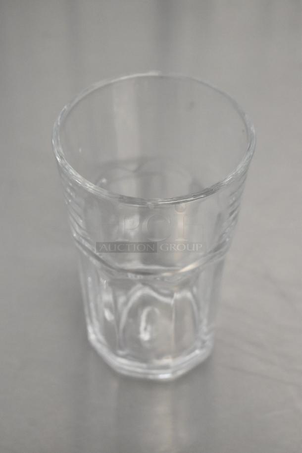Box of Acopa Memphis 9.5 oz. Highball Glass, scratch and dent, item 55351309H, shown brand new, clear glass design.