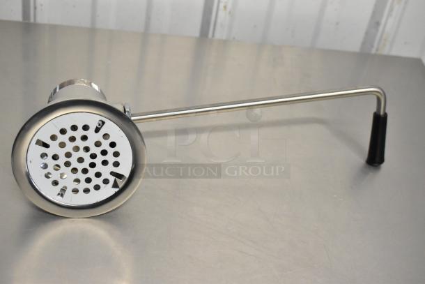 Brand new Regency 600DT1 twist handle waste valve, 3 1/2" sink opening, slight scratch and dent, stainless steel finish.