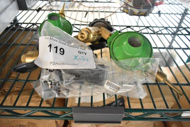 Three scratch and dent items: green connector and parts with packaging on a metal shelf. Auction tag 119 visible.