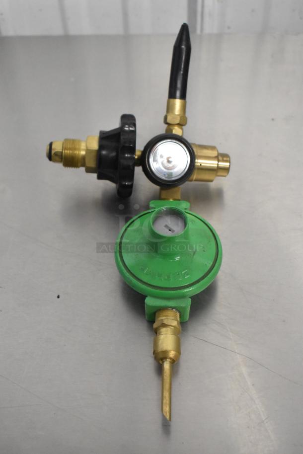 Brand new set including a handle and two connectors, each slightly scratched or dented. Features brass fittings and labeled "ZEPHYR".