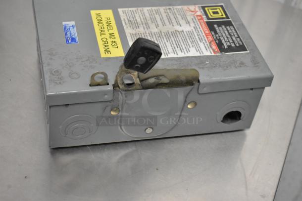 Eaton and Square D control boxes, used, visible label says "Panel M2 #37 Monorail Crane," includes safety warnings.