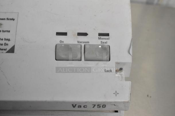 Food Saver Vac750 Vacuum Bag Sealer, buttons for On, Vacuum, Manual Seal, Lock; used condition with visible wear.