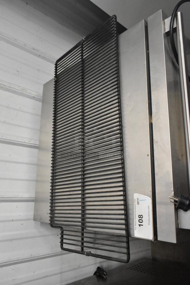 Metal pan with black poly rack, good condition. Label reads "LOT 108, QTY 1," indicating auction details.