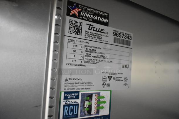 True T-23F-HC commercial freezer label showing model, 115V, 1 phase details, and NSF certification.