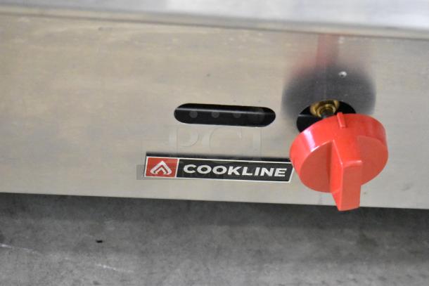 2024 Cookline CCB-36 gas grill, 90,000 BTU, missing grates. Features red control knob, Cookline logo visible.