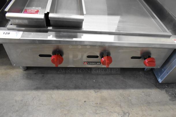 2024 Cookline CCB-36 commercial gas grill, 90,000 BTU. Missing grates. Features red control knobs.
