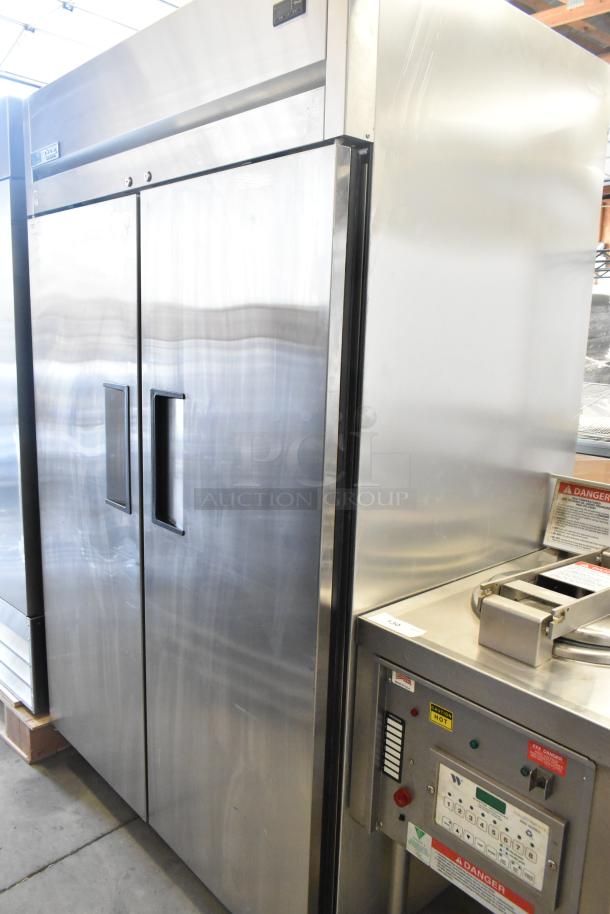 2020 True TG2R-2S-HC stainless steel 2-door commercial reach-in cooler on casters, 115V, excellent condition.