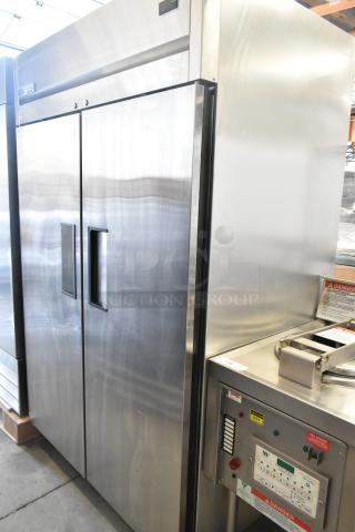 2020 True TG2R-2S-HC stainless steel 2-door commercial reach-in cooler on casters, 115V, excellent condition.