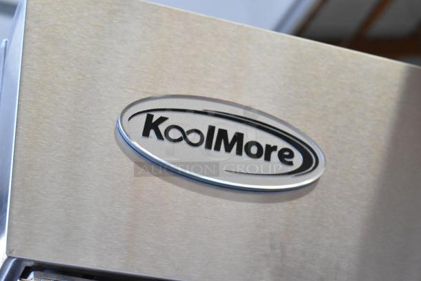 Brand new KoolMore RIF-3D-SS 3-door commercial freezer, stainless steel, 115V, 1-phase, logo visible. Scratch and dent condition.