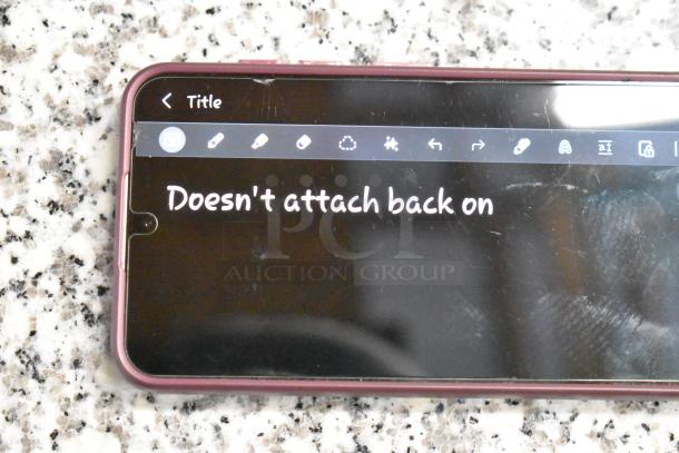 Unable to provide a description of the item. Image shows a phone screen with text: "Doesn't attach back on."