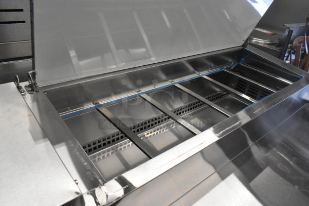 Brand new Avantco 178SSPPT3H commercial pizza prep table, 6 drawers, 115V. Scratch and dent condition, stainless steel.