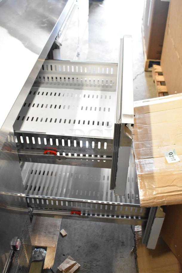 Brand new Avantco 178SSPPT3H commercial pizza prep table, 6 drawers, visible minor scratches. 115V, 1 phase, stainless steel.