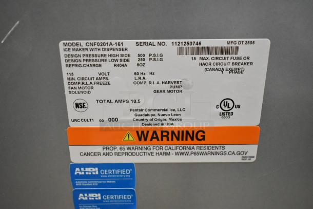 Manitowoc CNF0201A-161 ice maker label showing model, voltage, warnings, and AHRI certification.