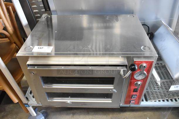 Brand new Avantco 177DPO18DS double deck countertop pizza/bakery oven; 240V, 1 phase. Minor scratches; red control panel.
