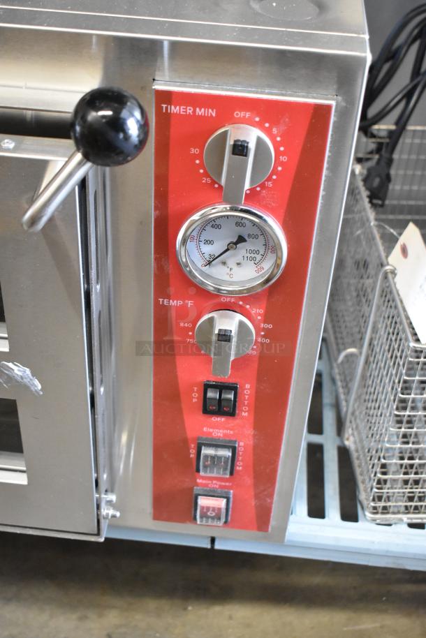 Brand new Avantco 177DPO18DS double deck pizza oven, 240V, controls shown, slight cosmetic scratches on surface.