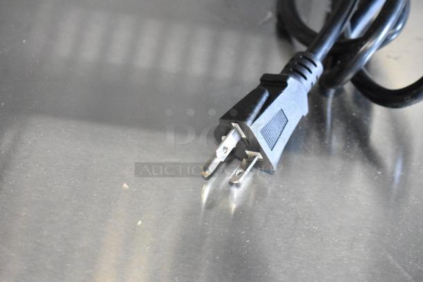 Power cord for Avantco 177DPO18DS Commercial Double Deck Pizza/Bakery Oven, 240V, 1 Phase, shown on a metallic surface.