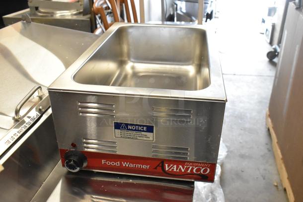 Brand new Avantco 177W50 electric countertop food warmer, 12" x 20", 120V, 1 Phase, with minor scratches.