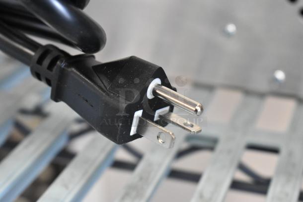 Black electrical plug for Avantco 177IC3500 induction range, indicating 208-240 volts, 1 phase, in new condition.