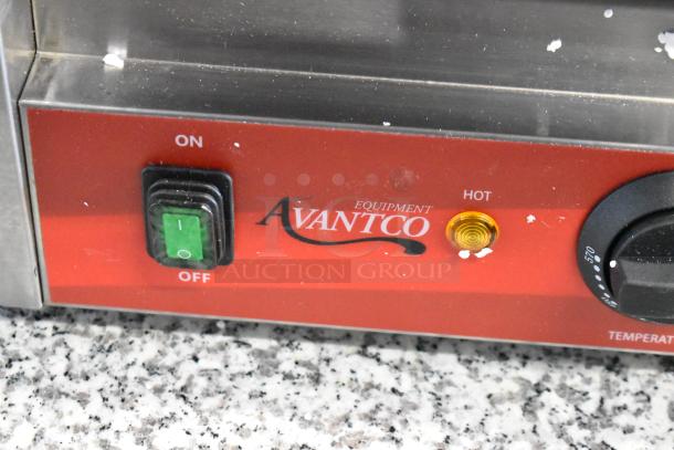 Avantco 177PG400 commercial panini grill, grooved plates, new scratch and dent, 19 5/8"x9 1/8" surface, 120V, 1-phase.