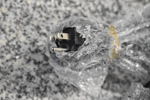 Alt text: Avantco 177PG400 Panini Grill, wrapped plug, new condition, dual grooved plates, 19 5/8" x 9 1/8" surface, 120V.