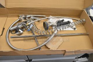 BRAND NEW Assure 190PRDX deck-mounted pre-rinse faucet, single inlet, scratch and dent condition, chrome finish, in box.