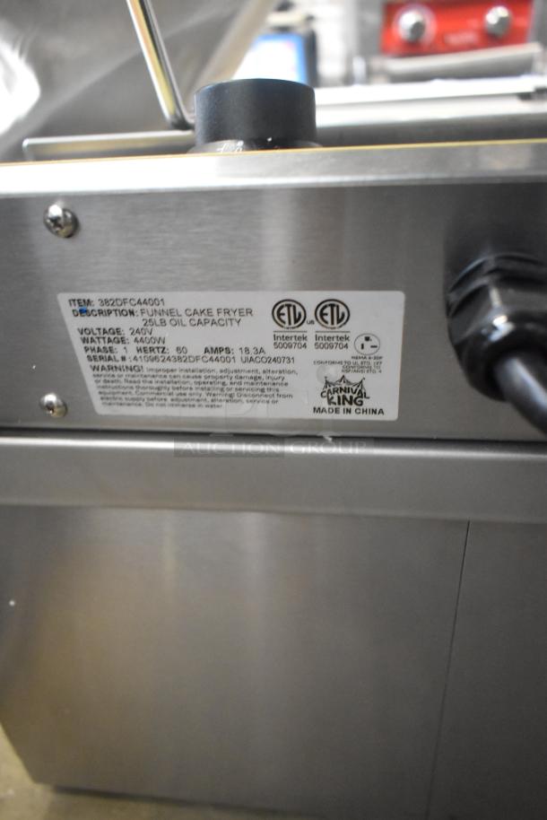 Brand new Carnival King 25 lb. funnel cake/donut fryer. Model 382DFC44001. 240V, 1 phase. Scratch and dent condition.