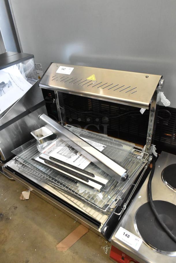 Brand new ServIt 423HDM26SA 26" heated display case; 3 shelves, sliding door, 120V, missing glass, Bunn MHG.