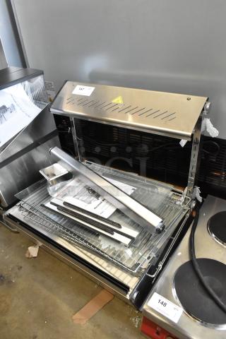 Brand new ServIt 423HDM26SA 26" heated display case; 3 shelves, sliding door, 120V, missing glass, Bunn MHG.