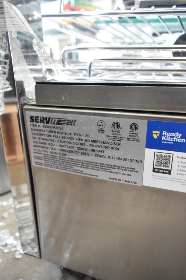 Brand new ServIt 26" heated display case, model 423HDM26SA, with sliding door and missing glass. 120V, 1 phase. Serial #1748409120069.