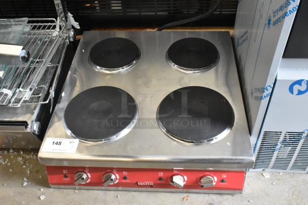 Brand new Avantco 177CER400 4-burner solid French-style electric range, 208/240V, 1 Phase, with minor scratches.