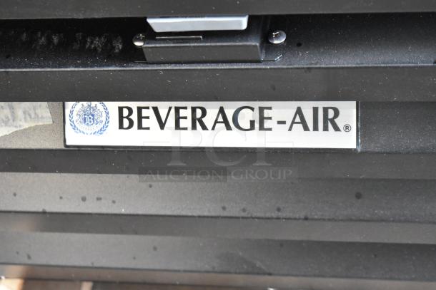 Beverage Air MMF12HC-1-B MarketMax 24" black glass door merchandiser freezer, brand new with scratches and dents, 11.9 cu. ft.