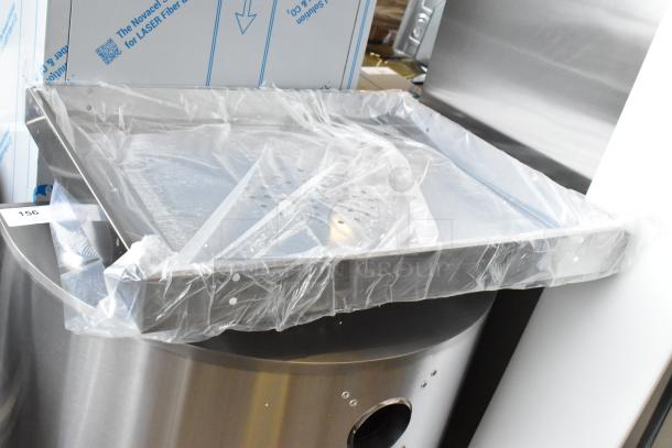 Brand new KoolMore Receptacle, scratch and dent condition, stainless steel, partially wrapped, with protective packaging.