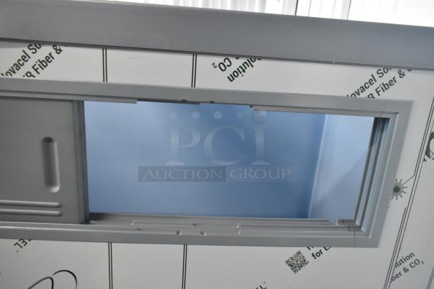 BRAND NEW Follett SG1650S-60 upright ice storage bin, 1660 lb capacity, visible SmartGATE feature, minor scratches.