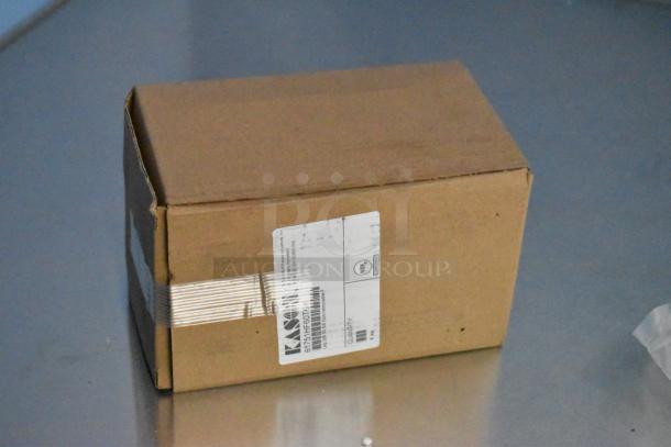 Brown cardboard box with a label, possibly containing components for a Follett SG1650S-60 Upright Ice Storage Bin.
