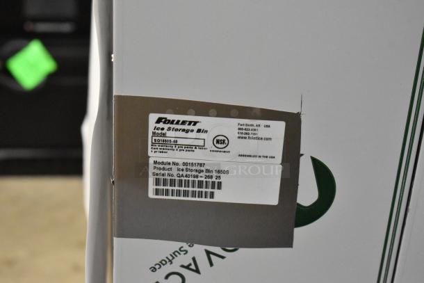 BRAND NEW Follett SG1650S-60 Upright Ice Storage Bin, 1660 lb capacity, with SmartGATE, scratch and dent condition, label shows model and serial numbers.