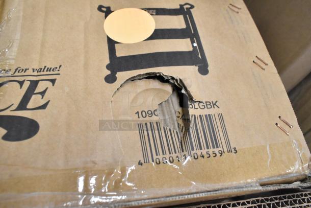 Cardboard box with visible dent and tear, showing partial barcode and stapled edges. Likely contains one of 14 mixed items.