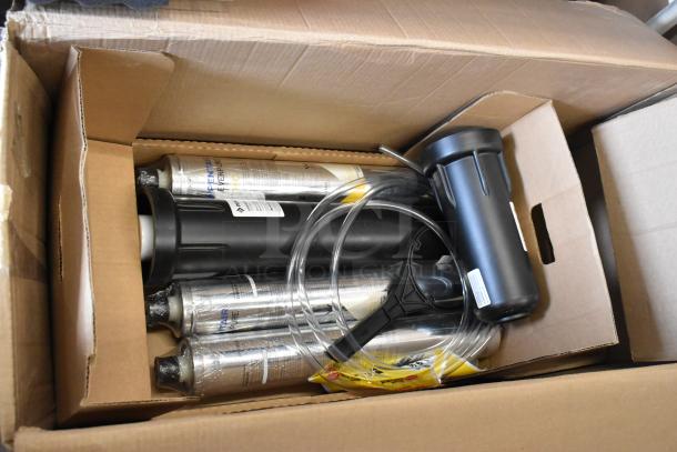 Brand new Everpure EV9329-73 High Flow CSR Triple-7FC Water Filtration System, .5 Micron, 7.5 GPM, visible pre-filter, slight packaging dents.
