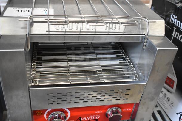 Brand new Avantco 184T140 commercial 10" conveyor toaster, 3" opening, 120V, 1 Phase, minor scratches, "Caution Hot" label.
