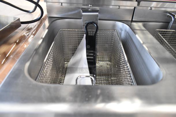 Avantco 177F202 dual tank fryer, brand new with scratch and dent, includes two metal fry baskets and lids, 208-240V, 1 phase.