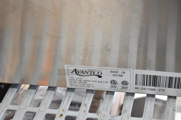 Brand new Avantco 177F202 30 lb. dual tank electric fryer with 2 metal baskets and lids. 208-240V, 1 Phase. Scratch and dent.