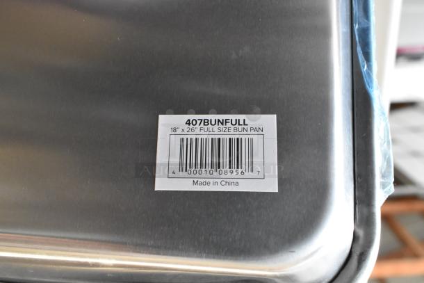 25 new scratch and dent aluminum sheet pans, Vollrath 5315 and 407BUNFULL models, labeled full size 18"x26".