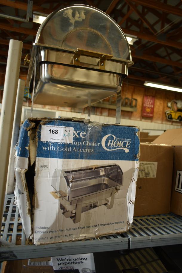 2 Choice Deluxe 8 Qt. Roll Top Chafers, gold accents, new condition with scratch and dent. Includes water pan and fuel holders.