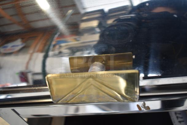 2 Choice Deluxe 8 Qt. Roll Top Chafers with gold accents, brand new, showing minor scratches.